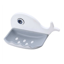 Soap dish mounted on a wall, demonstrating its adhesive and waterproof qualities in use